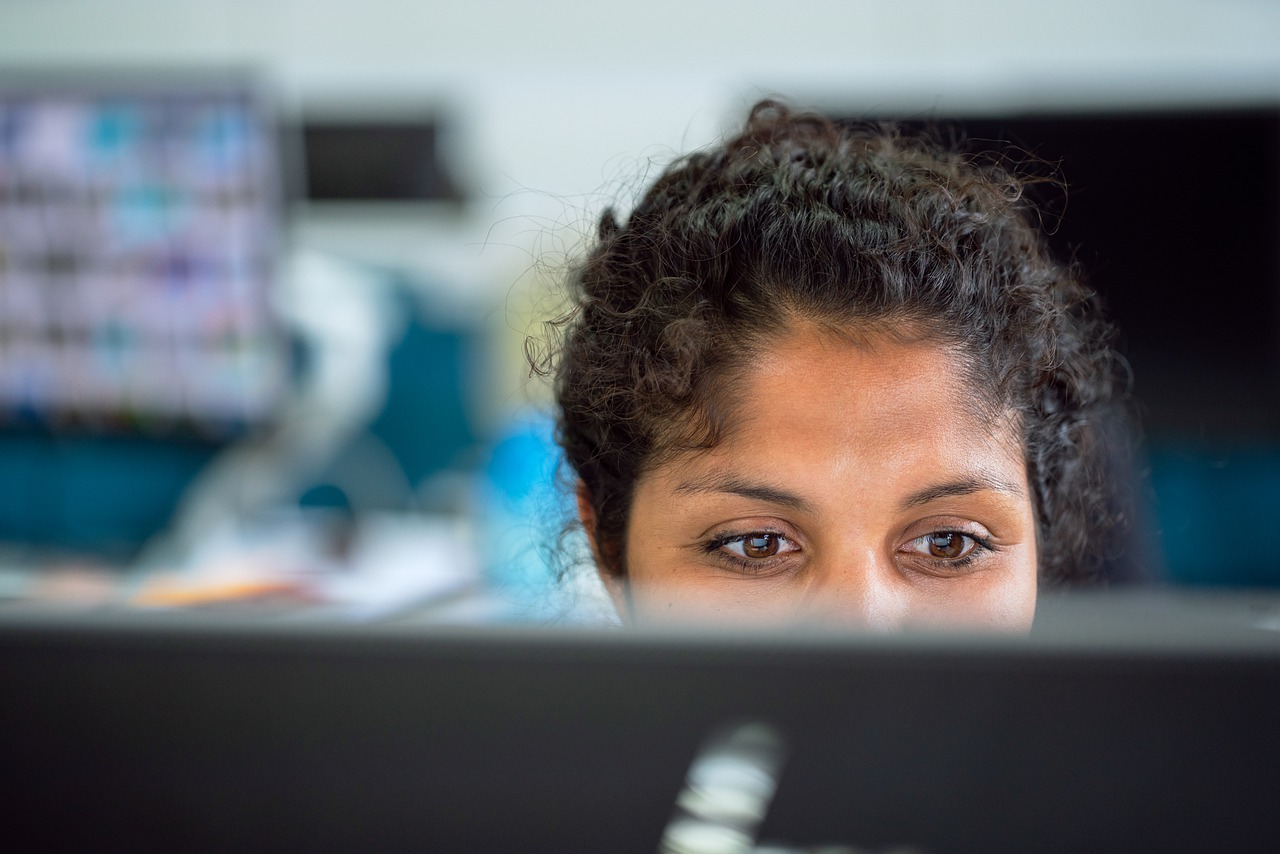 Image of a woman working in an office with air conditioning